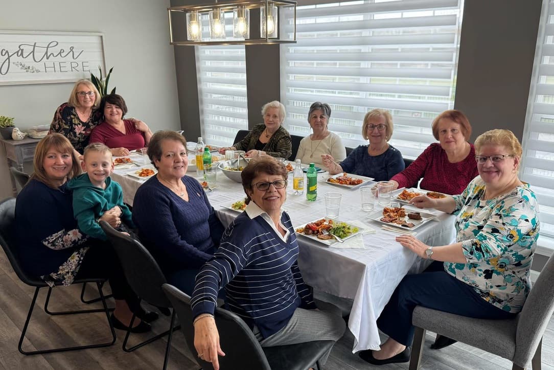 Neighbors sharing dinner
