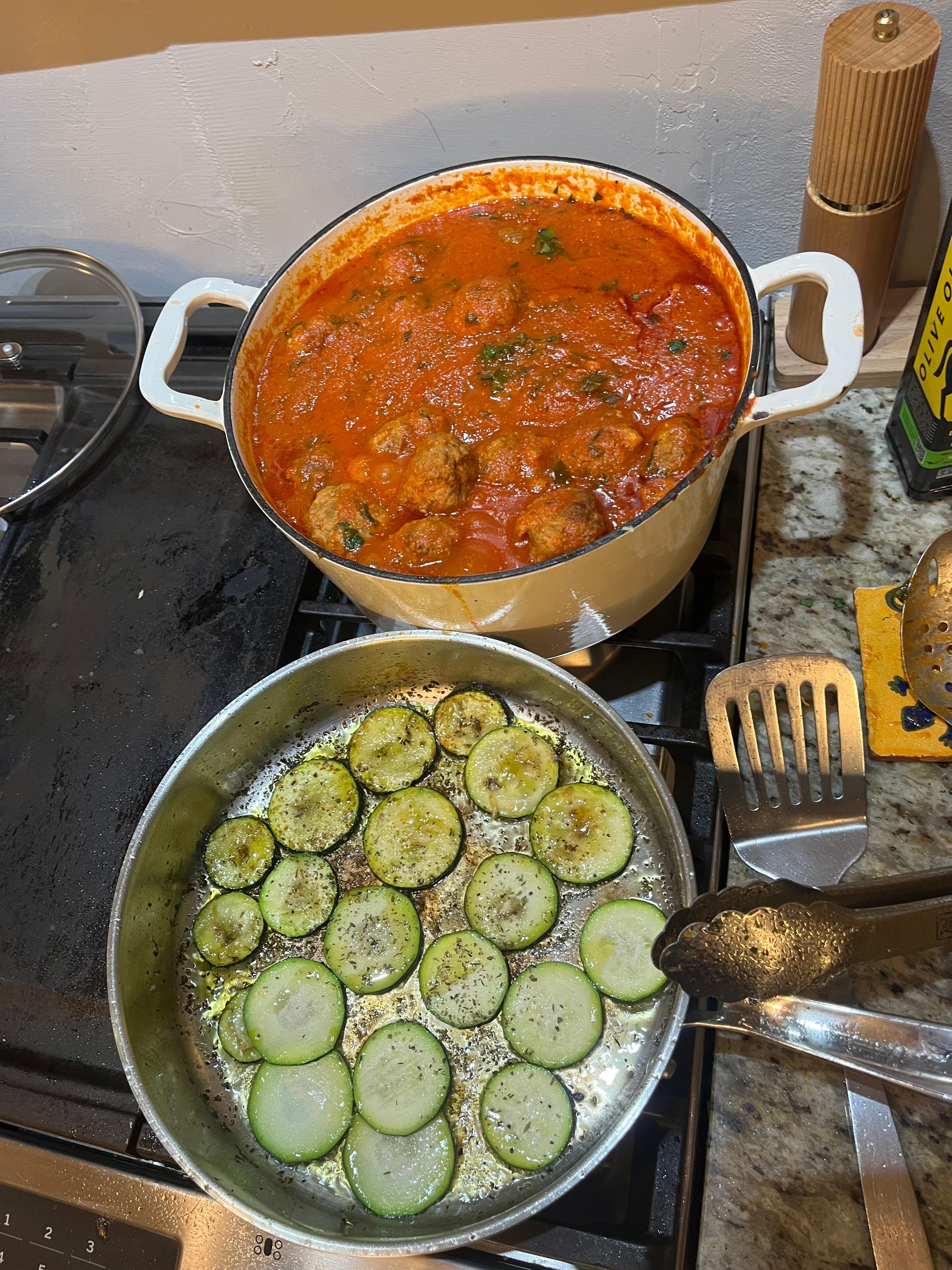 Family and neighbors sharing a meal at Kim's Austin LIFE cooking experience