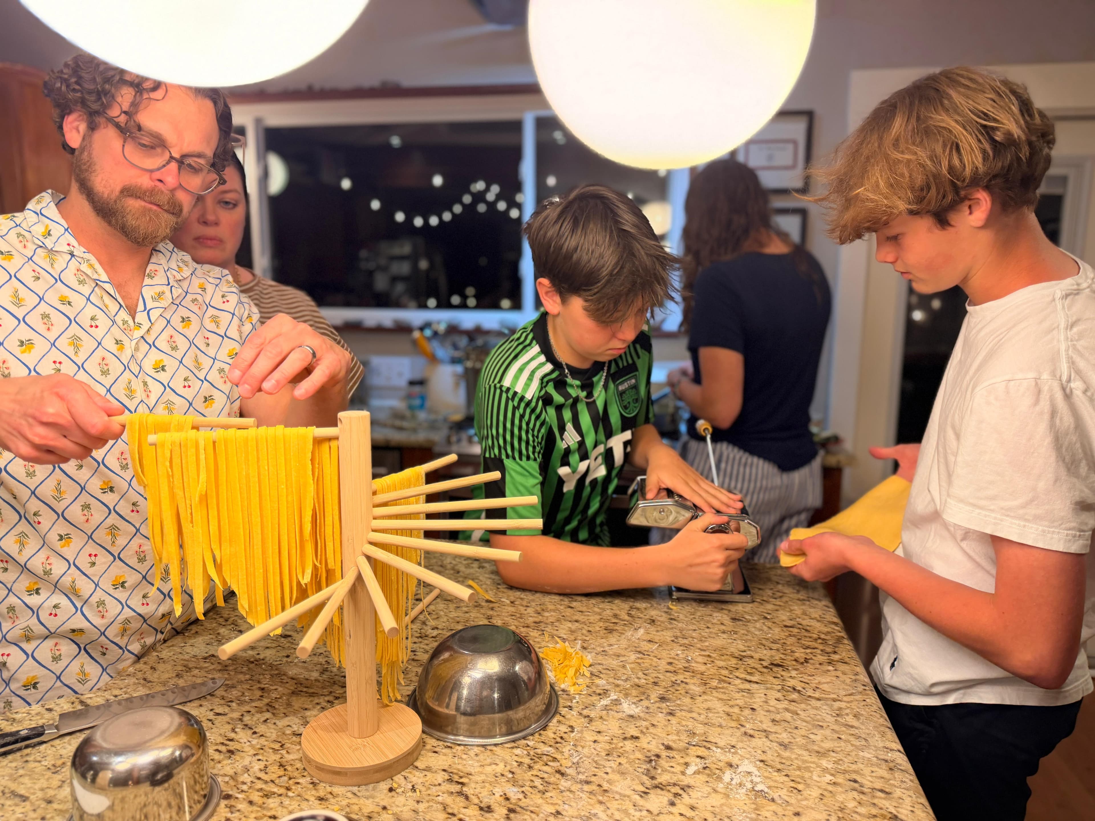 Austin neighbors around the table at Kim's LIFE cooking experience