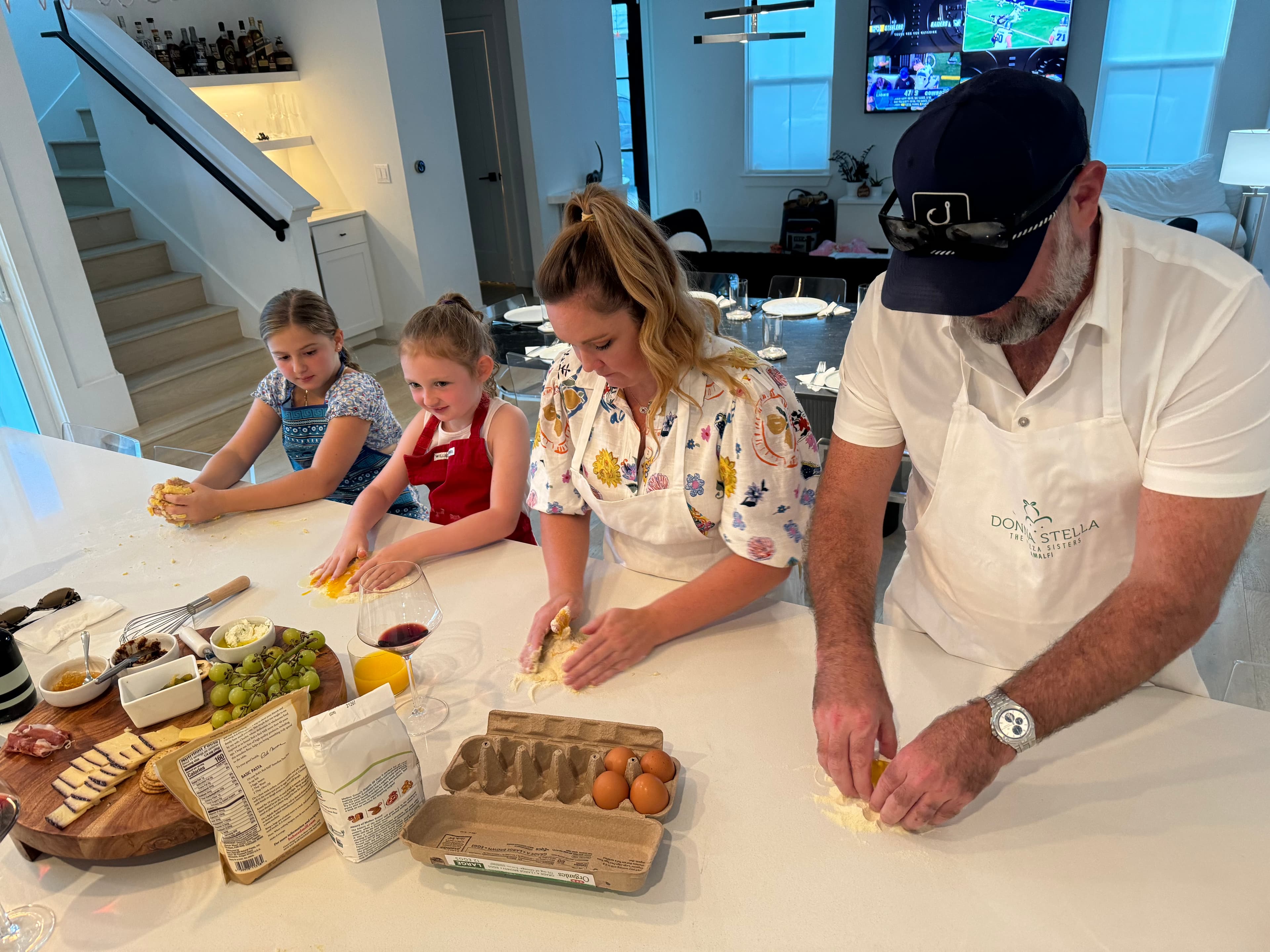 Family preparing pasta together